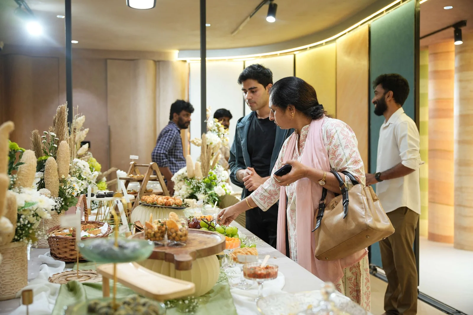 Guests gathered along the table in the Soul Studio showroom.